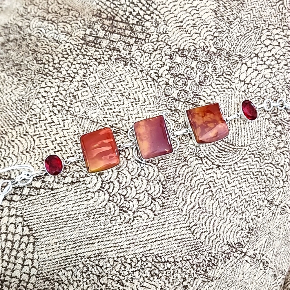 Sterling silver and red mookite and ruby adjustable bracelet.